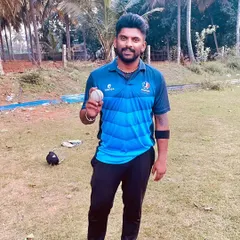 A bowler posing with the match ball after a great performance. We celebrate individual milestones that contribute to the team's success.