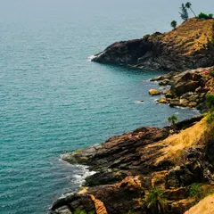 The stunning rocky coastline of Gokarna, a view from one of the many coastal treks I lead. It's a perfect blend of hiking and beach scenery.