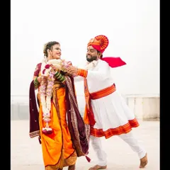 A playful moment during the varmala exchange, a classic part of a Maharashtrian wedding. I love capturing these lighthearted interactions that show the couple's personality and joy.