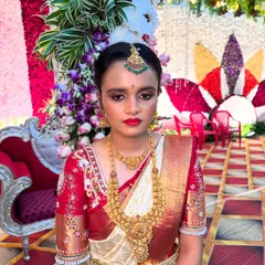 A full portrait of the bride Priyanka on her wedding day. Notice how the makeup stands up to bright event lighting while maintaining a soft, non-cakey finish, a key technique we cover.