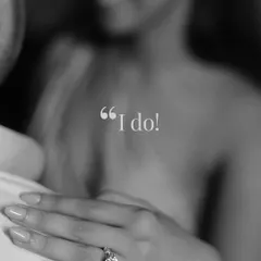 The two most important words. This artistic close-up on the engagement ring and the bride's hand is a beautiful way to announce the beginning of your forever.