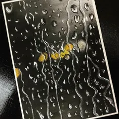 My take on a rainy monsoon day, using oil pastels to create the effect of water droplets on a window. It was a fun challenge to create a sense of depth and transparency.