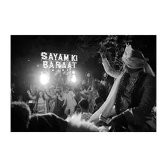 The energy of the Baraat! We capture the groom's procession with all its dancing, music, and excitement, a key part of the wedding story.