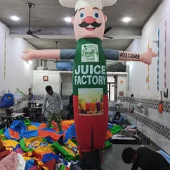 This chef-themed air dancer was created for a juice factory. Notice the detailed apron with the brand's logo and imagery, all printed in-house.