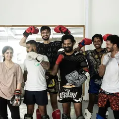 The crew after a tough session. We train hard, but we always end with smiles and good energy. This is our community, and there's always room for one more.
