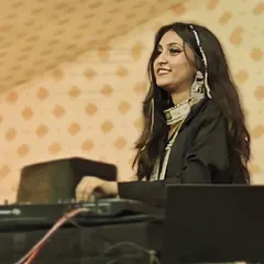 A moment of joy behind the decks. Seeing the crowd happy and dancing is the best part of my job as a professional Garba DJ.