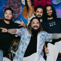A fun, high-energy group shot. This is the vibe we bring both on and off the stage. We're all about music, madness, and mayhem.