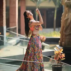 Capturing the flow and grandeur of this artistic lehenga against a beautiful outdoor backdrop. My poses are designed to make the outfit the hero of the story.
