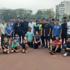 A group photo with the entire team. We are a family of athletes supporting each other on and off the track.