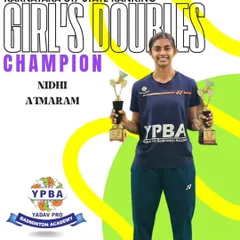 Nidhi Athmaram winning the Girl's Doubles Champion title at the Karnataka U17 State Ranking tournament.