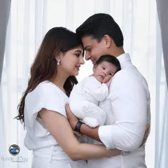 The first family portrait. These lifestyle moments are so precious, capturing the connection between mom, dad, and their new baby in a natural and heartfelt way. These sessions are relaxed and focus on your family's love.