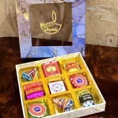 This "Happy Diwali" gift box is filled with cracker-themed chocolates. It's a fun and unique take on festive gifting, perfect for clients and employees with a sweet tooth.