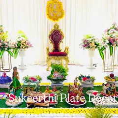 An elegant puberty ceremony setup I did in Bangalore. The arrangement is clean and sophisticated, with a mix of floral elements and traditional dolls.