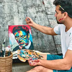 A different angle showing the concentration required for portrait work. Every brushstroke adds to the character of the piece. In my workshops, I provide personal guidance to help you with these details.