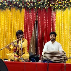 Sharing the stage with the legendary maestro Pt. Ajay Prasanna during a live concert. Accompanying a master of the flute is always a profound learning experience.