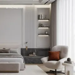 This bedroom exudes quiet luxury with its sophisticated neutral palette. I used a combination of fluted panels, classic wall molding, and a dark marble accent behind the bed. The built-in backlit shelving provides a beautiful spot for displaying personal items.