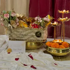 This is where the magic of Diwali comes alive in my 'Rang & Noor' collection. I've combined a beautiful floral arrangement with traditional diyas and gourmet treats in a handcrafted basket, creating the perfect festive gift.