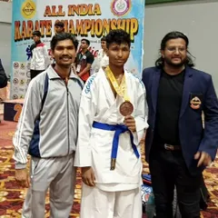 Posing with my national bronze medalist student, Neeraj B, at the All India Karate Championship. Guiding students to reach such heights is the greatest reward of a teacher.