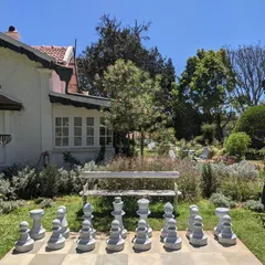 We added playful and elegant features like this life-sized chessboard to enhance the guest experience on the hotel grounds.