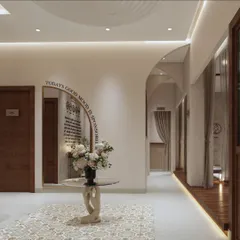 This is a glimpse into a private treatment room at Tattva Wellness. The design is intentionally minimal, with a calming color palette and a simple, elegant mirror feature to create a space focused on peace and rejuvenation.