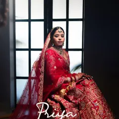 An elegant, moody portrait of the bride. The use of shadow and light creates a dramatic and artistic image that feels like a magazine cover.