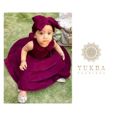 A closer look at the details of my custom velvet party dress. Made from the softest material for delicate skin, this design features a full, tiered skirt for a touch of drama and a sweet Peter Pan collar. The oversized bow headband is the perfect finishing touch for a memorable look.