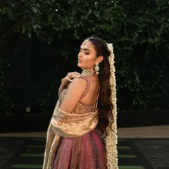 Save this for your bridal Mehendi inspiration! This look features a stunning braided ponytail with fresh flowers, paired with a soft glam makeup look that enhances the bride's features beautifully.