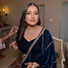 Dressed in a rich velvet saree, this client wanted a bronze makeup look to match. I used warm tones and shimmers to create a glowing, sculpted look that complemented her diamond jewelry and the deep blue of her outfit.