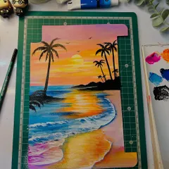 The finished artwork for the sunset beach iPad cover, laid out before being placed in the case. You can see the rich texture and color blending of the acrylics, from the sandy shore to the glowing sun.