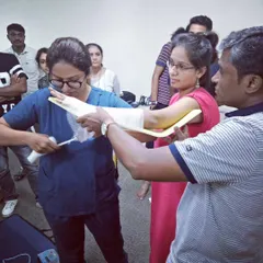 Learning how to properly splint a limb during a first aid workshop. In the wilderness, you are the first responder, and these skills can save a life.