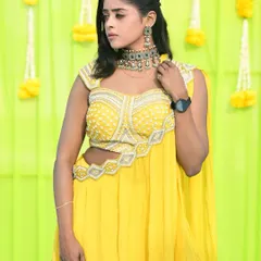 A modern choker with intricate details, rented for a festive occasion. This piece is perfect for pairing with a bright yellow lehenga for a haldi or sangeet ceremony.