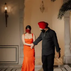 The surprise begins. A blindfolded bride-to-be is gently led to the spot where her life will change forever.