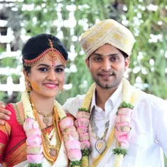 A close-up of a bride and groom in their traditional wedding attire. The richness of our Gowda culture is something I am proud to promote and preserve through my work.