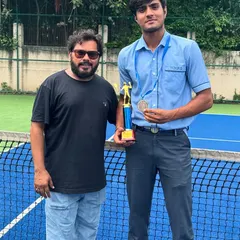 Here I am with Govind Singh Khokar of our Boys Under-19 team, who helped secure the Silver Medal at the CBSE Cluster Tennis Championship.