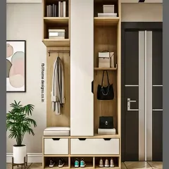 An all-in-one entryway organizer. This unit features shoe storage at the bottom, a seating bench, coat hooks, and overhead shelves for bags and other essentials, keeping the entrance tidy.