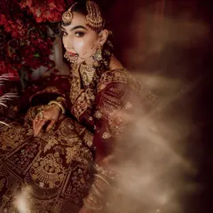 Our "Chand ka Tukda" bridal campaign. This image captures a dreamy, artistic portrait of our model, showcasing a regal and traditional bridal style.
