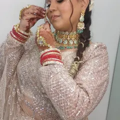 A close-up of our bride getting ready. We provide the complete look, from the plus-size lehenga to the perfectly matching jewellery.