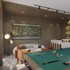 The room includes a comfortable lounge area with a curved sofa, perfect for spectators or for relaxing between games.