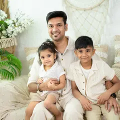 A proud father with his two wonderful children. I aim to capture the unique bond each parent shares with their kids.