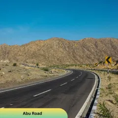 The winding Abu Road cutting through the dry, hilly landscape of Rajasthan is a joy to travel on in our comfortable caravan.