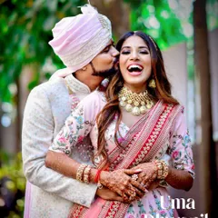The pure, uninhibited laughter between a couple is what we live to capture. This candid shot showcases the genuine connection and happiness that make wedding photography so special.