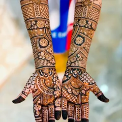 Even our youngest clients get the full mehendi experience. This is a full-arm design for a 6-year-old, showing our ability to create intricate patterns for all ages.
