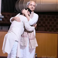 Another angle of that heartfelt moment with my Guru. His embrace feels like a transfer of knowledge, blessings, and immense love.