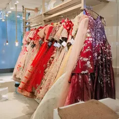 Racks filled with color and sparkle. This is just a small section of my extensive collection of rental lehengas, waiting for you to explore.
