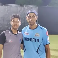 We believe in giving our players the best exposure. Here is one of our academy boys getting tips from the legendary Ashish Nehra during a net bowling session for the Gujarat Titans IPL team. These are the kind of opportunities that build future champions.