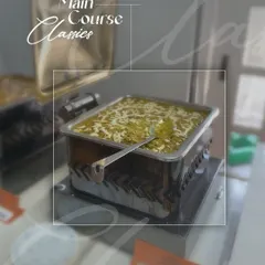 A close-up of one of our main course classics, served in a modern, stylish chafing dish. We ensure that our food presentation is as exceptional as the taste.