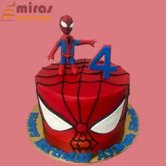 Your friendly neighborhood Spider-Man swings into the party on this vibrant cake. The design features his iconic mask, a fondant web, and a hand-sculpted Spidey figurine ready for action, perfect for a superhero's fourth birthday.