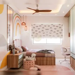This kids' room features a rainbow wall mural and a cozy bed nook. The design combines soft pastels with natural wood tones, creating a cheerful and calming space for play and sleep.