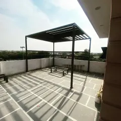 A newly installed MS pergola on a client's terrace. This structure is the foundation of a complete terrace makeover, ready for lighting, seating, and plants.