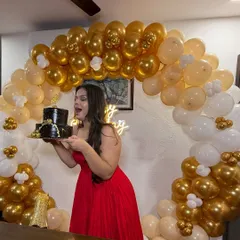 Getting ready for a birthday party! I created a glamorous look with soft smokey eyes and wavy hair for the birthday girl in her beautiful red gown.